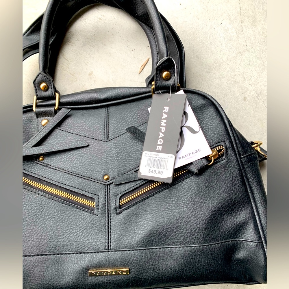 Woman’s black handbag. Brand new with tags.  Never used